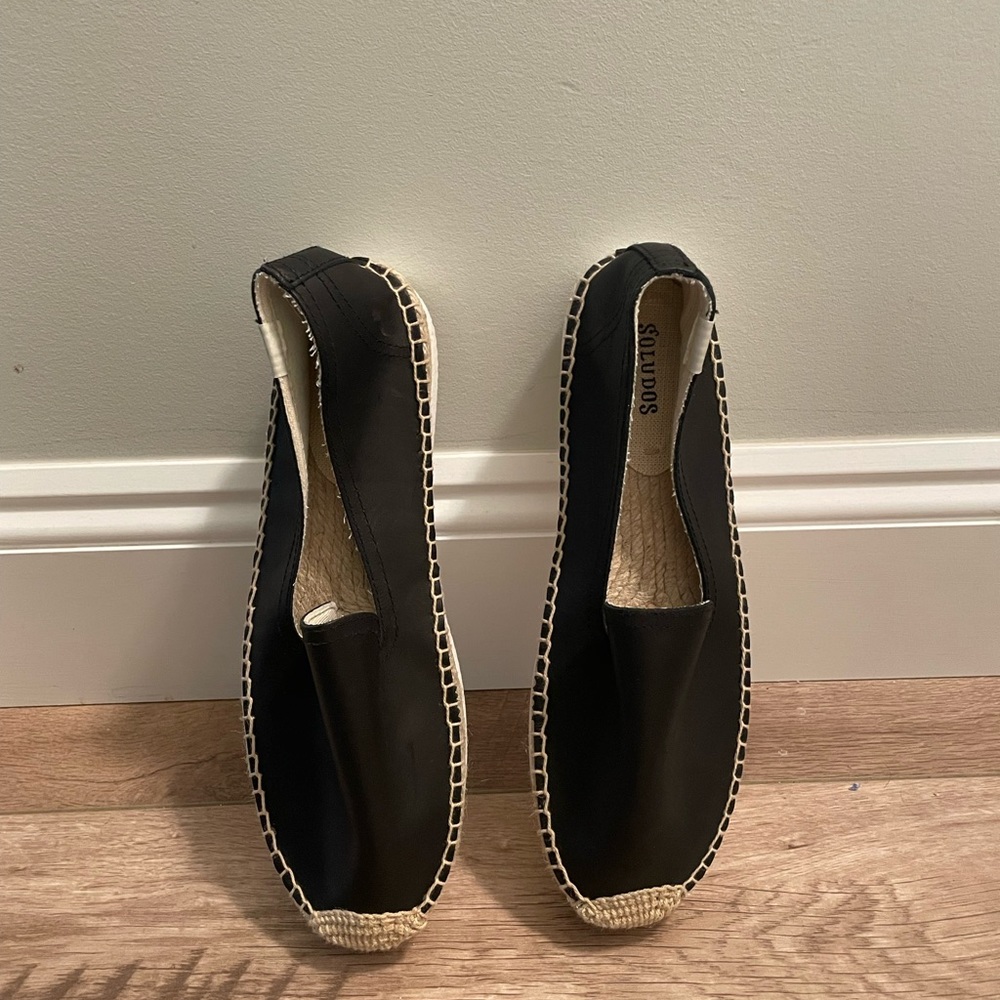 Soludos size 8.5 (39). Never worn. Black with white bottom.